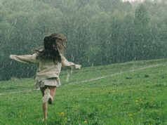 Bhaav Attarache – भाव अत्तराचे A Person Running in a Grass Field While Raining