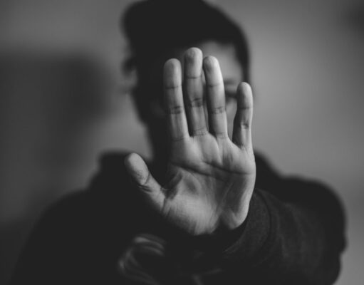 When It’s Time To Stop? close-up photography of person lifting hands