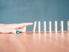 Sequence person holding white and blue plastic blocks