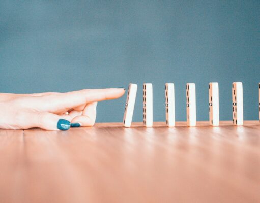 Sequence person holding white and blue plastic blocks