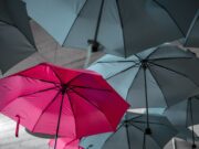 Be Unique assorted umbrellas hanging on ceiling