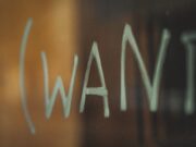 Wants – इच्छा white letters on brown wooden table